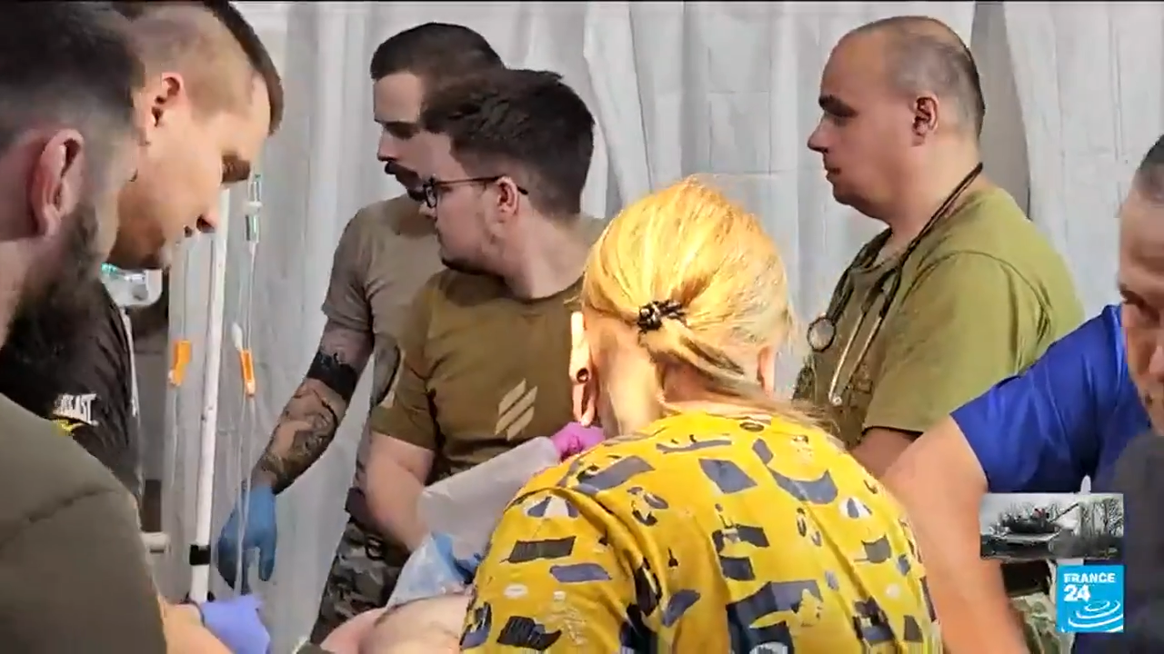 Doctors battle to help the wounded at 'stabpoint in' Ukraine, and more of today's top videos